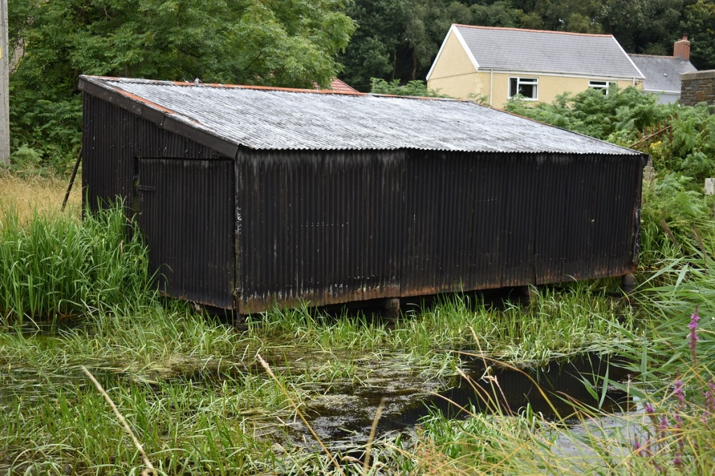Port Tennant Company (Canal) Weed Cutter Barge Shed at Jersey Marine.
